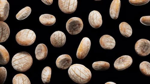 Baked Bread Loaves Falling and Spinning Motion Graphic