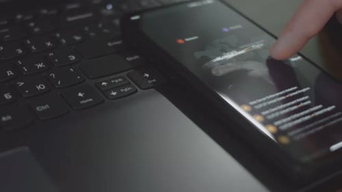 Smartphone Digital Threat Map on Laptop Keyboard