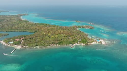 Drone view of Isla Grande in Rosario Islands, Colombia, surrounded by crystal clear Caribbean