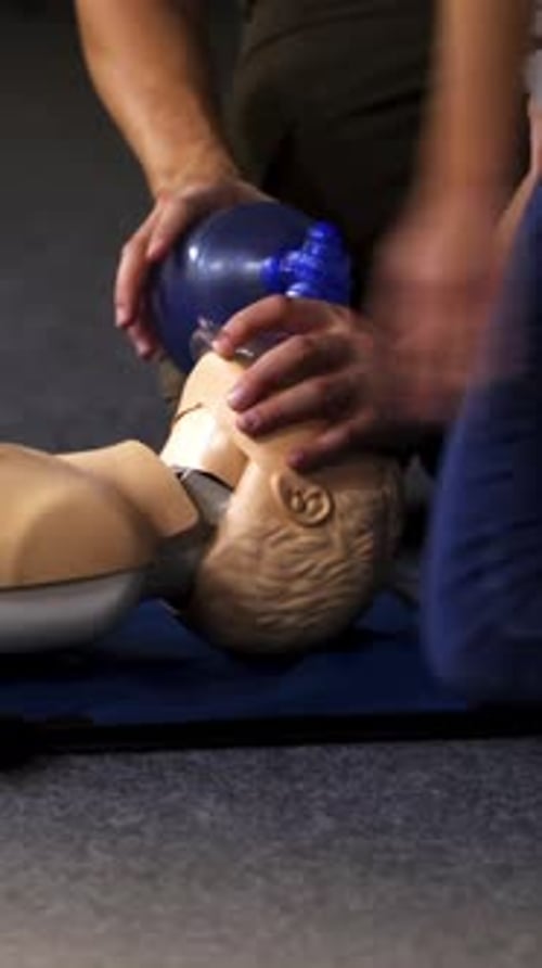 CPR Training Using Bag Valve Mask on Mannequin