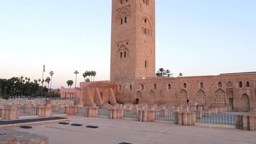 Koutoubia Mosque with remains of first mosque in foreground, Marrakesh. Tilt up