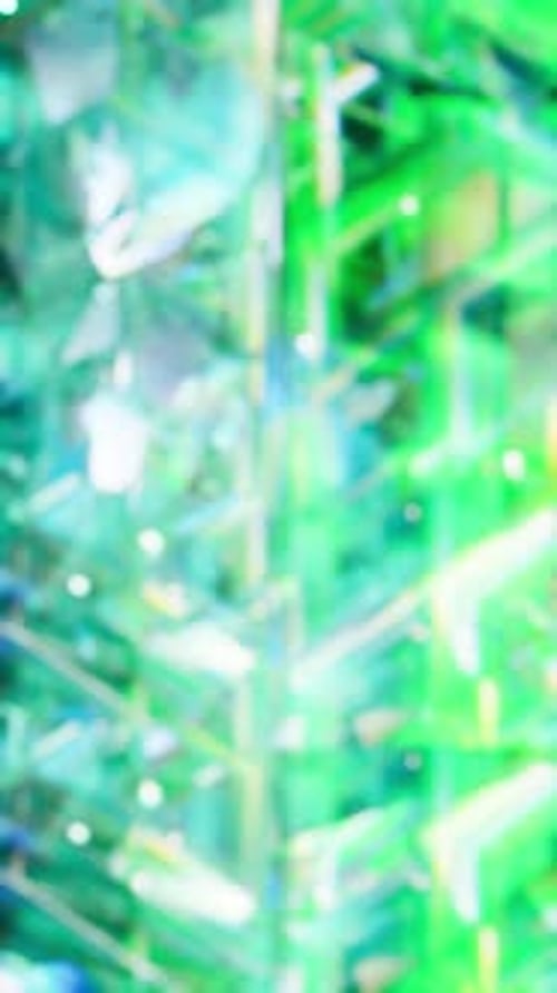 A Blurry Image of Green and Blue Glass