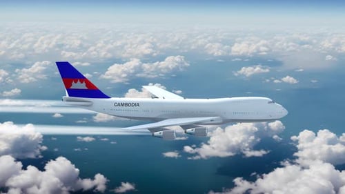 Commercial Airliner Passanger Plane Jumbo Jet Flying Over Clouds With Country Flag Cambodia