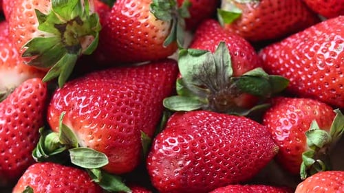 Rotating strawberries background rotating
