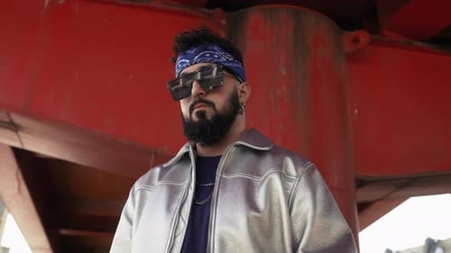 Stylish Bearded Man with Headband and Sunglasses in City