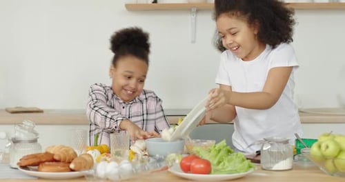Kids Having Fun During Food Preparation