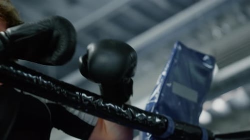 Boxer in Ring Corner Prepares for Fight