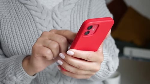 Brest Belarus 02 August 2022 Female Hand Using Iphone 12 Young Woman Holding Smartphone in Her Hands