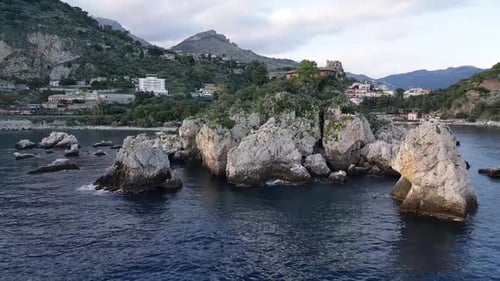 Rugged Landscape Of Isola Bella In Taormina, Sicily, Italy - Drone Shot