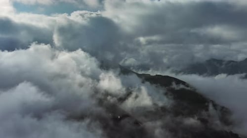 Aerial High View of Dramatic Clouds Flying