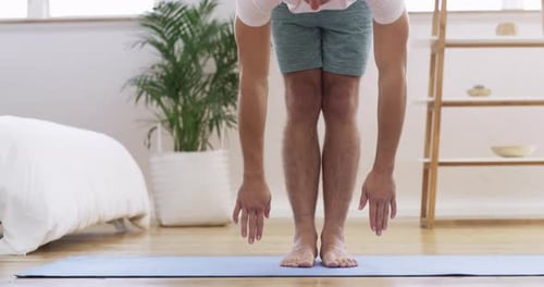 Man Doing Toe Touch Exercise at Home