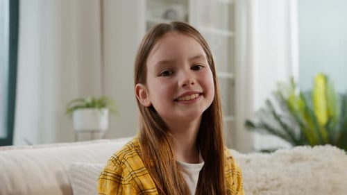 Carefree Smiling Caucasian Cute Kid Little Girl Looking at Camera Smile Toothy Health Teeth Joyful