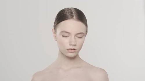 Beautiful Young Woman Poses and Smiles