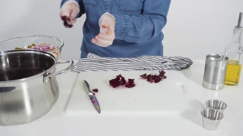Step By Step Cutting Cookies Vegetables on a White Cutting Board for Vinaigrette Salad