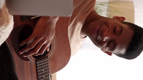 Vertical Video Online Music School Guitar Man Home