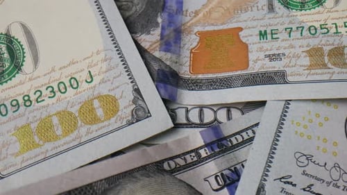 Close-up of Scattered One Hundred Dollar Bills