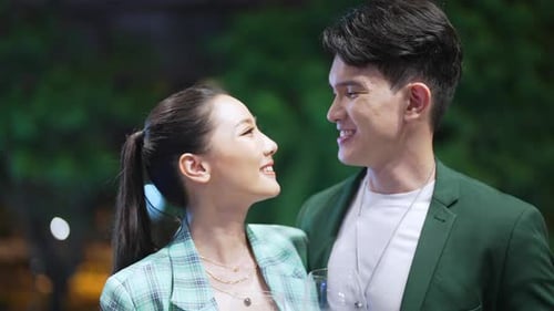 4K Asian couple shopping together at shopping mall on holiday vacation.