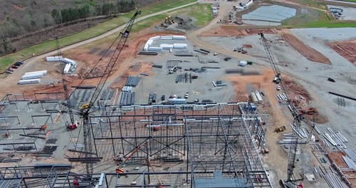 During the Construction of Industrial Buildings Crawler Cranes are Used for the Construction of