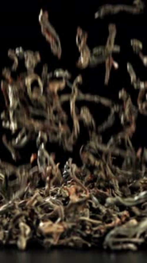 Dry Tea Falls on the Table Filmed on a Highspeed Camera at 1000 Fps