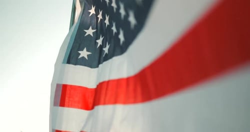 American Flag Waving in Sunlight Close Up