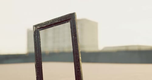 Framed View of Urban Landscape at Sunset with Modern Buildings in Background
