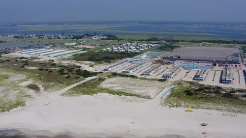 Pulling away from a private club along Long Beach in Long Island