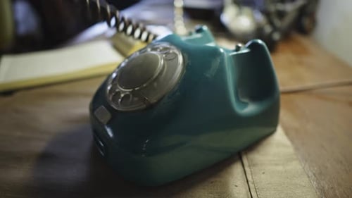 Vintage Turquoise Rotary Telephone Dialing Close Up