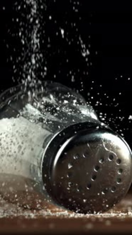 Salt Falls on the Salt Shaker Filmed on a Highspeed Camera at 1000 Fps