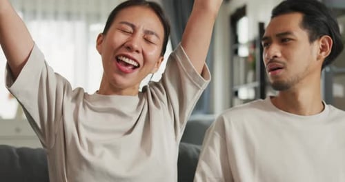 Woman Wins Video Game, Man Reacts