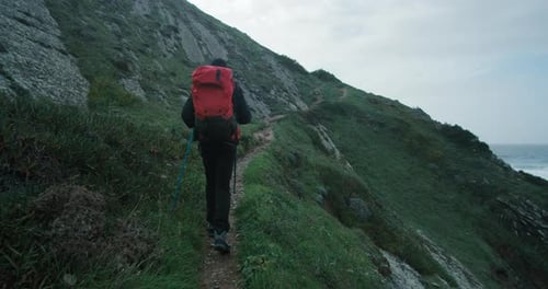 Young Man Hike on Cinematic Coast Mountain Road