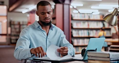 College, stress or student in library with paper for brainstorming, deadline or research on laptop