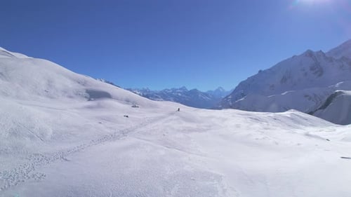 Aerial Birds Eye View Two Hikers on Trekking Trail to Tilicho Lake in Himalayas with Mountains