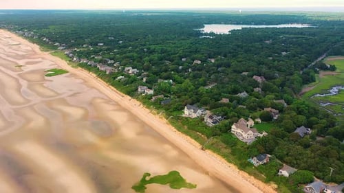 Coastal Aerial View of Beachfront Homes and Shoreline
