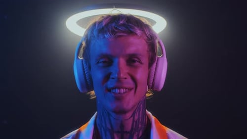 Smiling Man Wearing Headphones with Halo Close Up