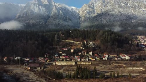 Aerial View Of Small Town At Mountain