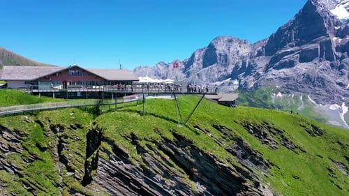 Tourists on one of the most stunning Viewing Station in Switzerland Alps