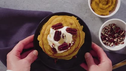 Pumpkin Pancakes with Pecans, Cream and Syrup