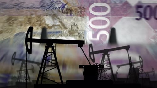 Qatar Riyal money counting with oil pump