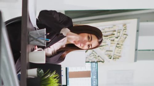 Vertical Video Graphic Design Consultant Who Uses Holographs to Shape Layouts