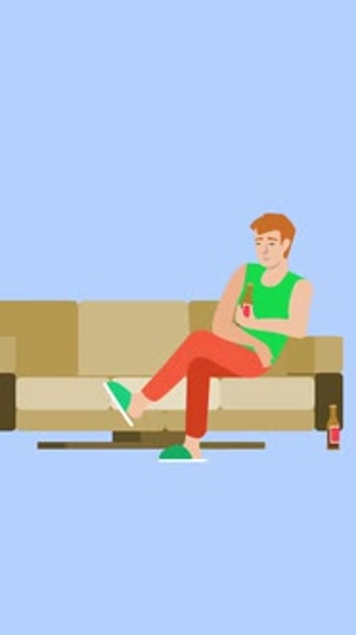 The Man Sitting On The Sofa Sips His Drink In His Hand Vertical