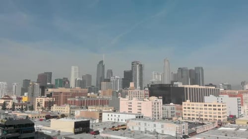 Drone shot over Downtown Los Angeles during the day.