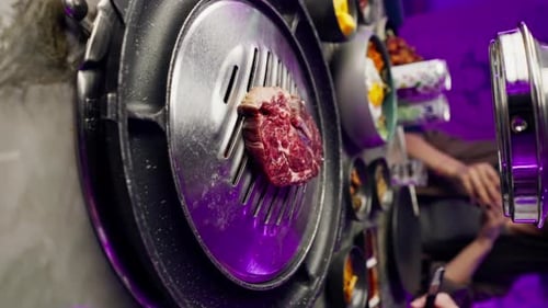 vertical video close-up of delicious appetizing juicy piece of raw meat being grilled in restaurant