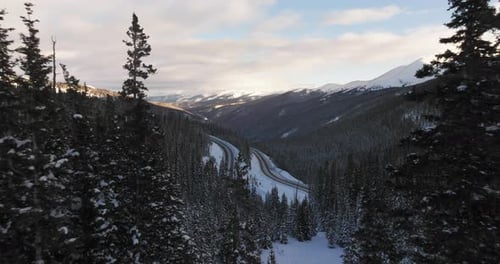 Aerial views of winding roads in the Colorado Rocky Mountains