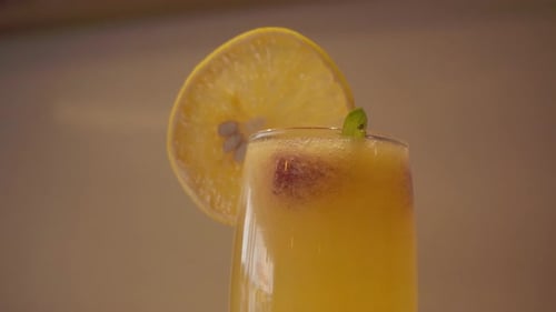 Close up of citrus drink with lemon slice