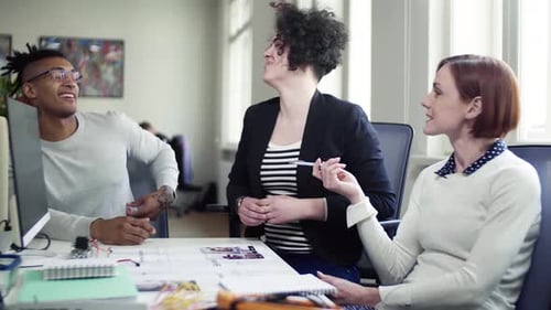 Young business team discussing startup ideas in a modern office space