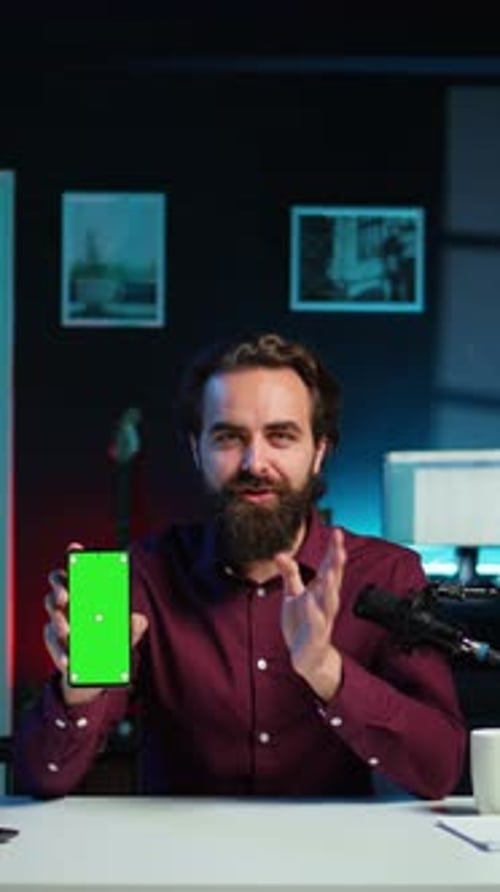 Vertical Video Content Creator Reviewing Mockup Phone Received From Sponsor Close Up