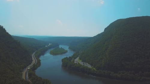 Aerial shot of the highway by the river