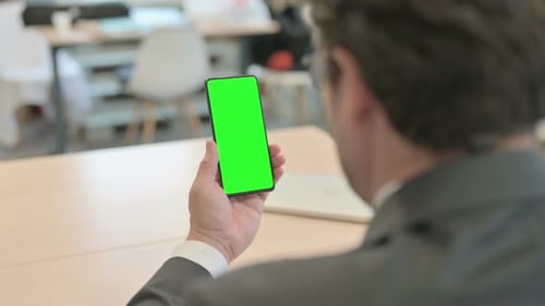 Businessman Watching Smartphone with Chroma Key