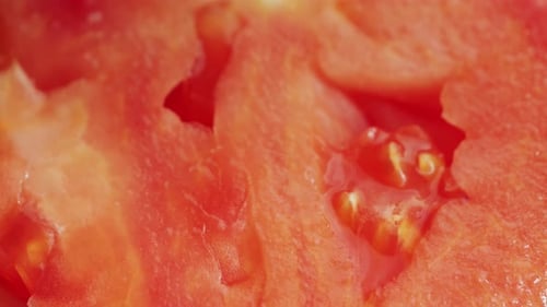 Close up of juicy fresh tomato, texture concept.