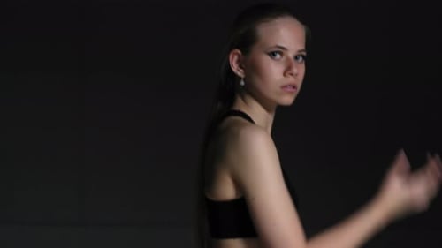 Energetic Young Woman Choreographer Performing in Studio
